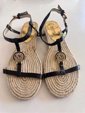 Michael Kors Black Patent Rope-Trim T-Strap Sandals with Gold MK Medallions